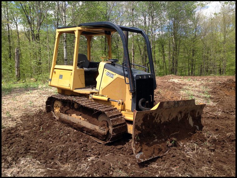 My new dozer is a 2001 John Deere 450H with 2000 hours. 