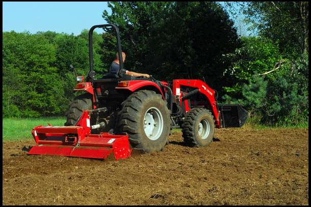 After liming and fertilizing, we pulled out our Woods Rotary Tiller and got a finely pulverized seedbed which also helped to mix the lime and fertilizer.  This also helped to smooth out the seedbed.