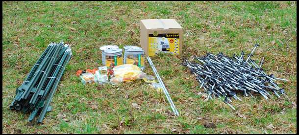 Here are the materials. T-Posts are for corners. Step-in posts are for runs between the corners. We used tape on the outside fence and wire for the inside fence. 