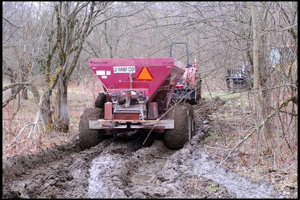 We needed heavy equipment to pull out the filled lime spreader. Once out we decided to abandon the back plots. It was just too wet. I had a dry field that was a lower priority but it was dry so I used the 6 tons for that field.