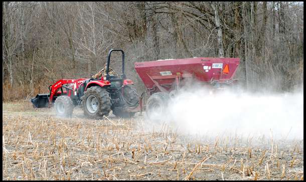 By the time we were done the field was entirely gray.  It took about 1 full day to spread 20 tons.